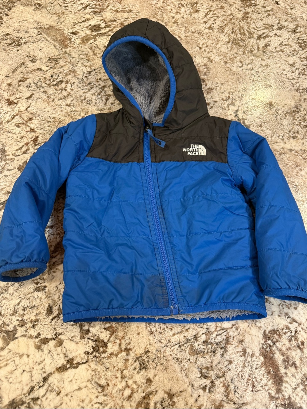 The North Face Kids Blue and Black Hooded Puffer Jacket
